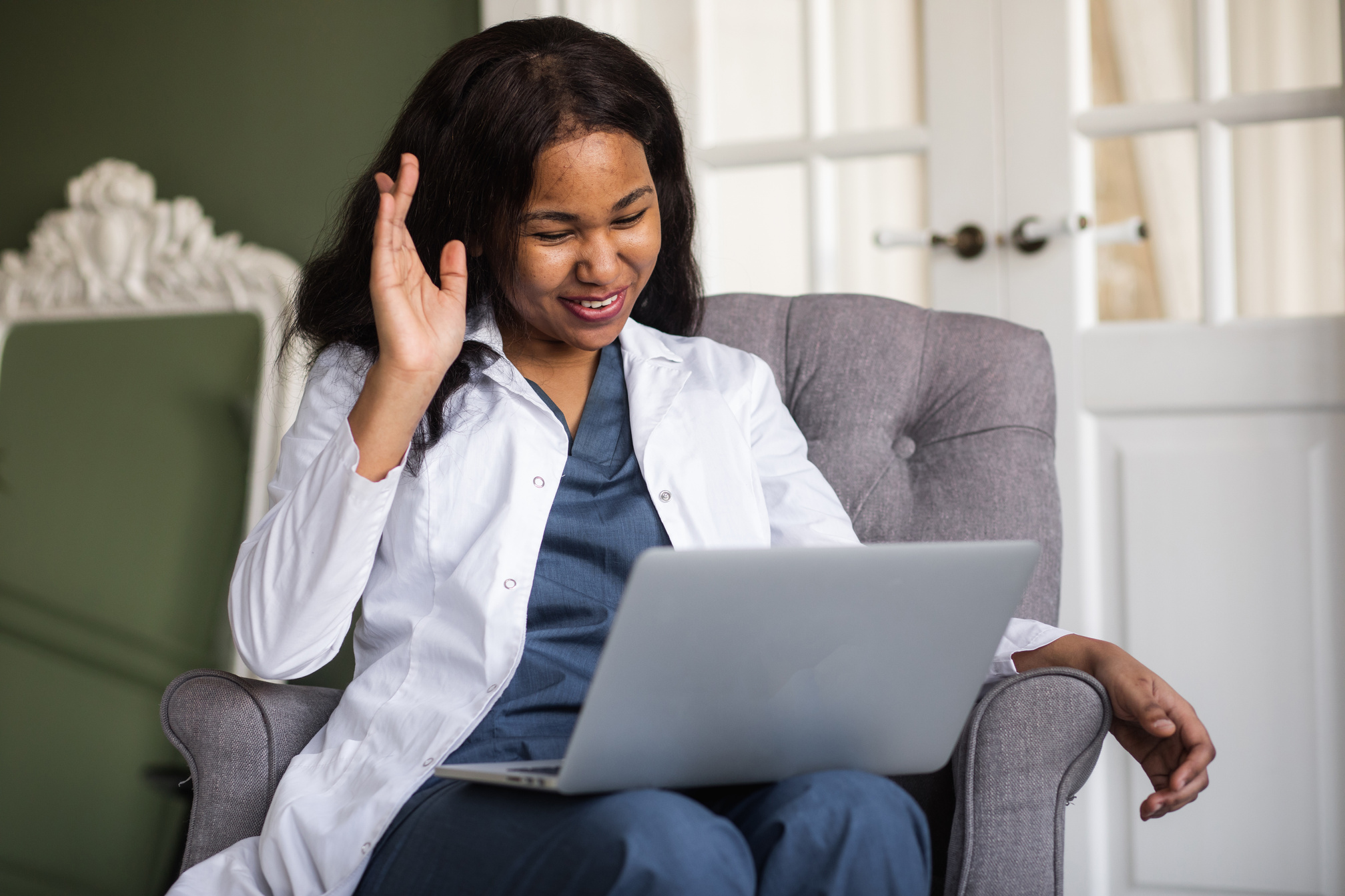 telehealth with virtual female doctor appointment and online therapy session. Black female doctor online conference